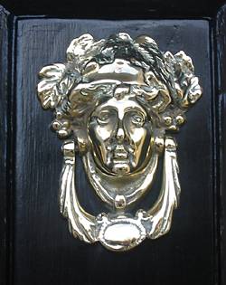 silver face door knocker in dublin digital photo by chris martin
